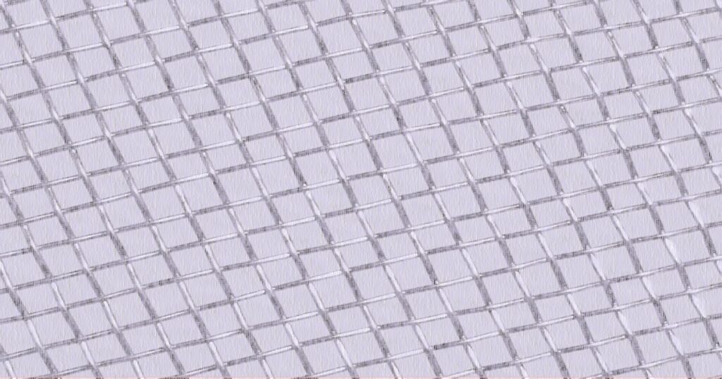 乾燥工程で使用されるフッ素樹脂メッシュベルトの網目の拡大写真
